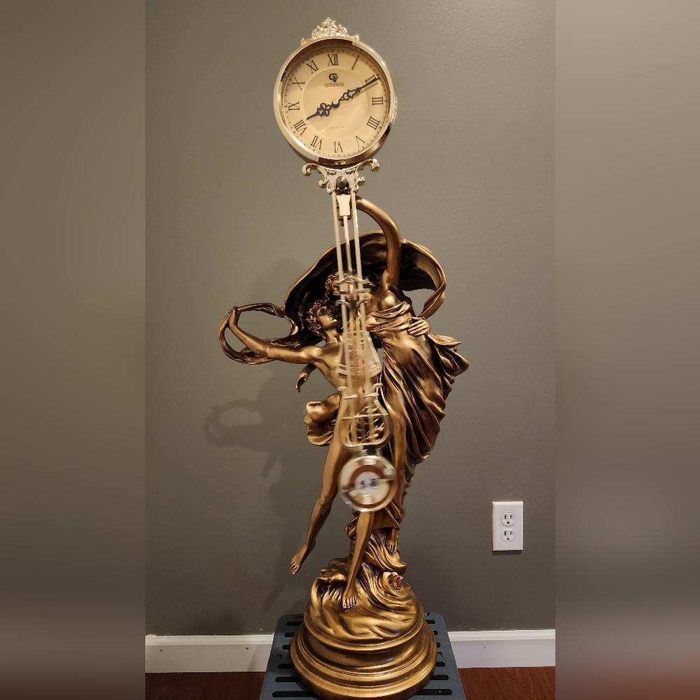 Gold Sculptural Clock with Roman Numerals